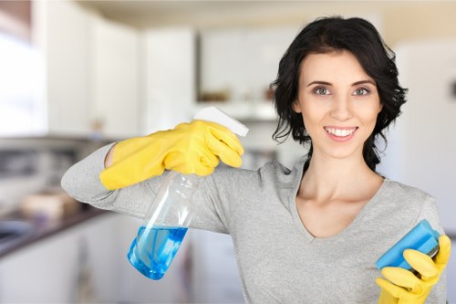 Professional office cleaning supplies on a desk in a business setting