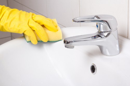 Treating a sofa stain with a microfiber cloth